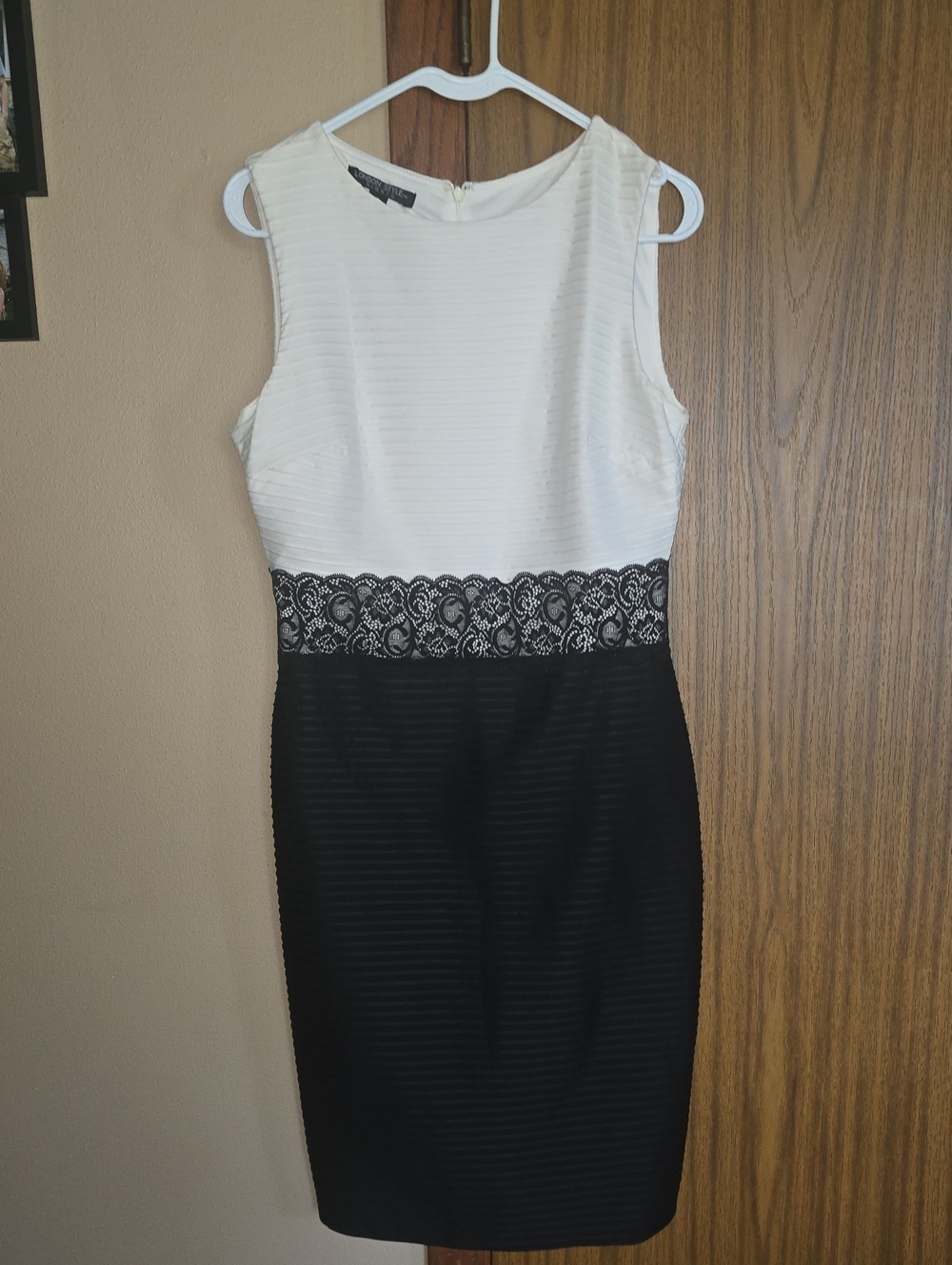 Sleeveless White and Black Lace-Accented Midi Sheath Dress